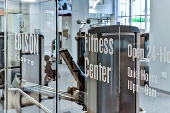 A gym with a sign that says Fitness Center.